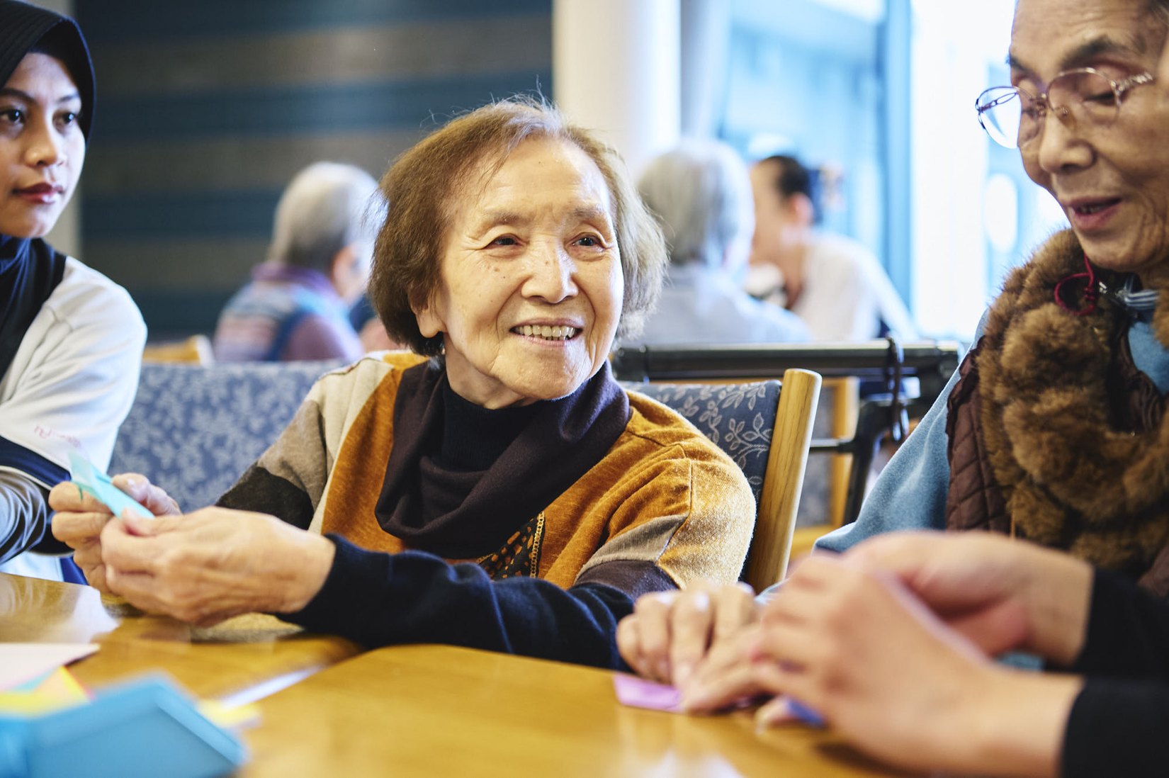 Older adults enjoying a craft activity together